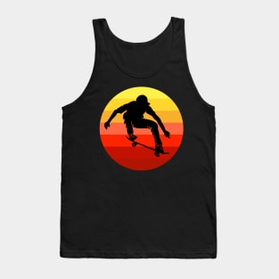 Extreme skateboarder flying in front of retro vintage sunset Tank Top